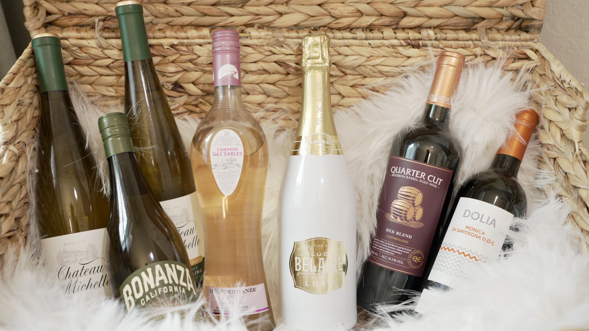 Curated wine selection in woven basket